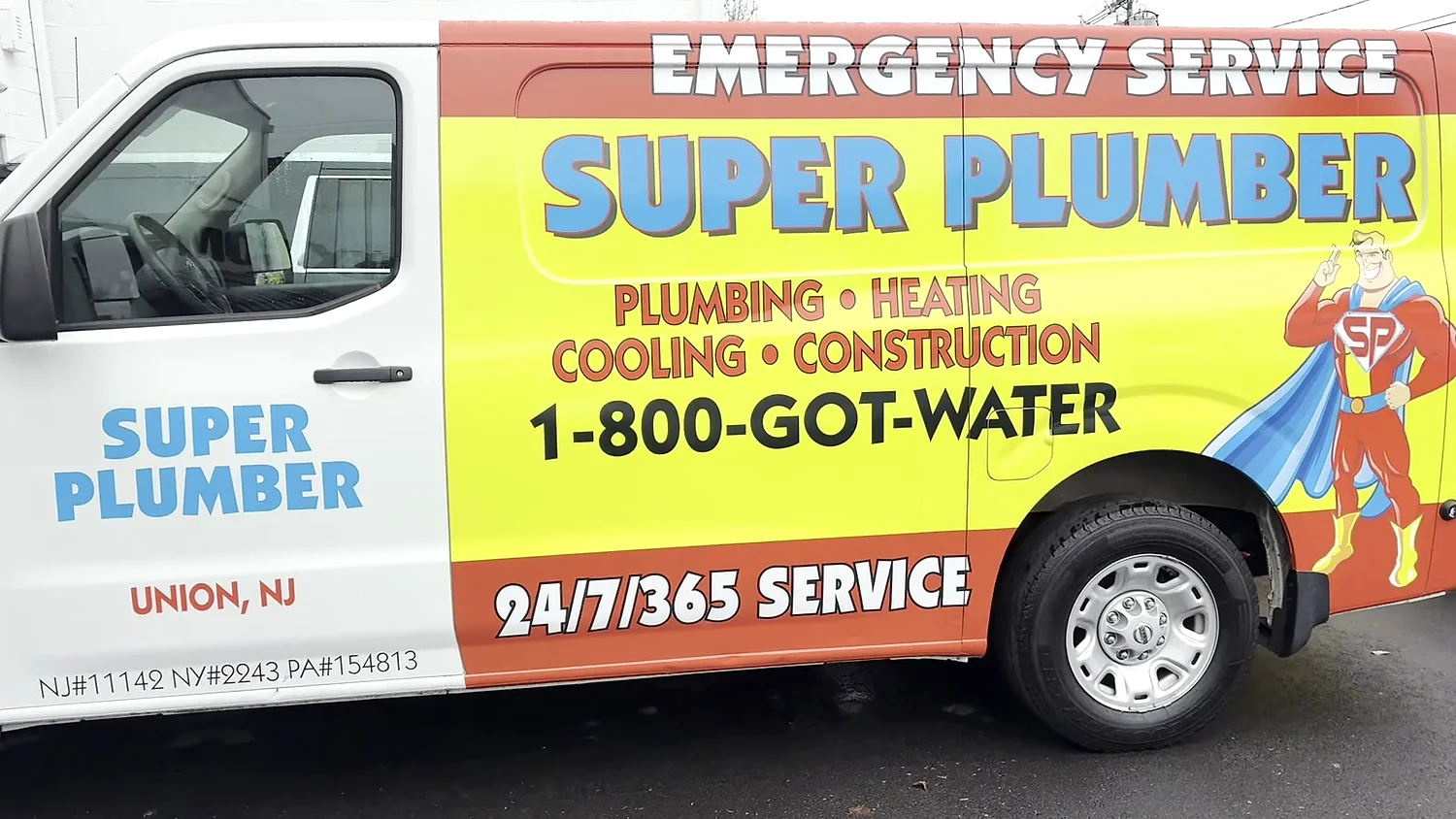 Bright yellow and red Super Plumber van wrap with a superhero mascot, services list and 1-800-GOT-WATER phone number, Union NJ