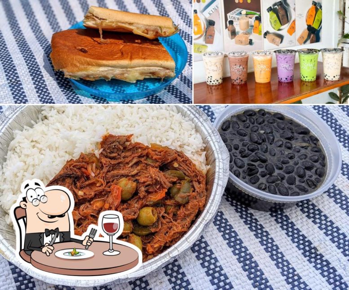 Cuban food collage — Cubano sandwich, ropa vieja with rice and beans, batidos